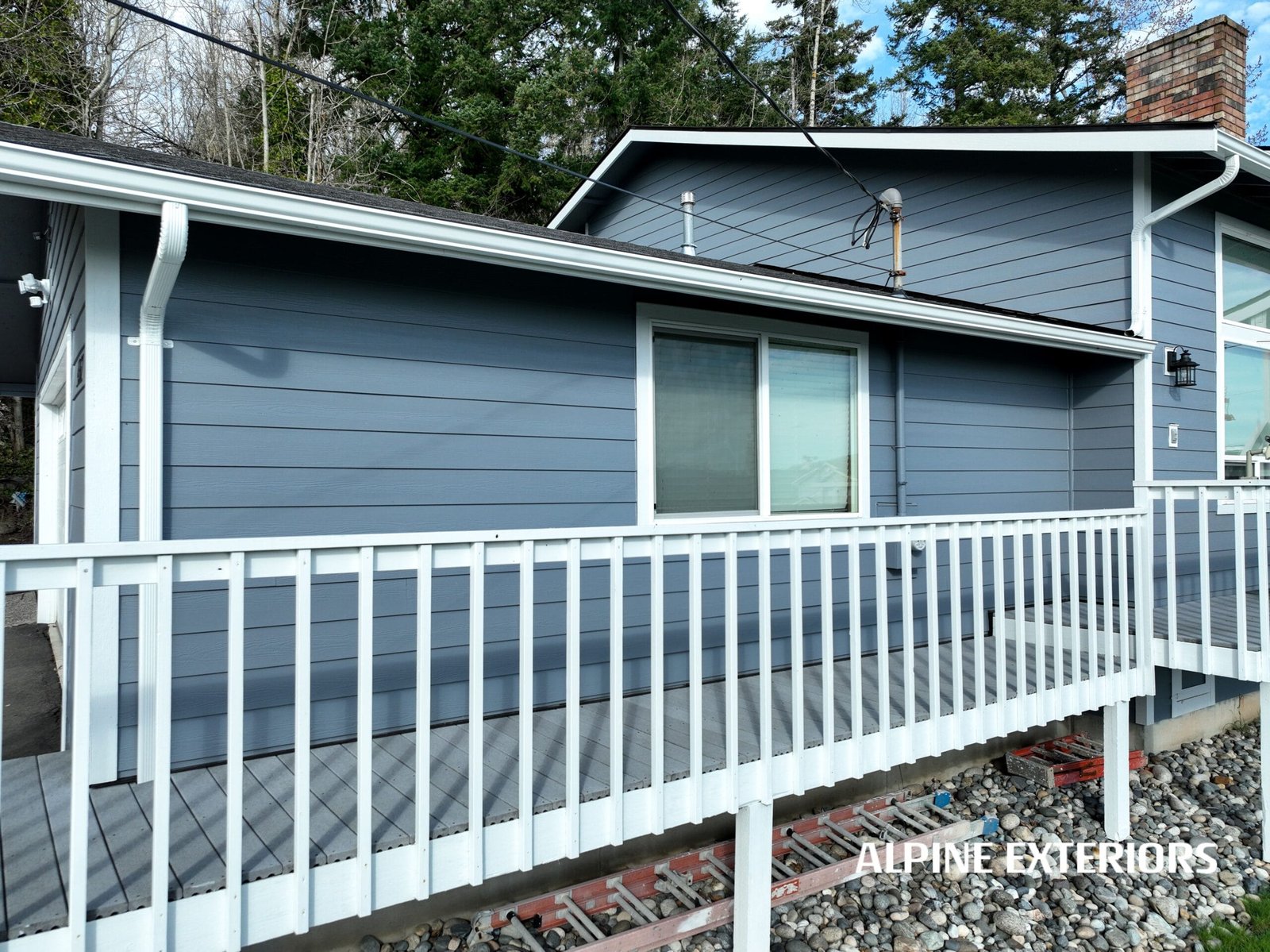 Low slope roof replacement – bellingham, wa – new low slope gaf roof installed for better drainage and leak prevention in bellingham residential area.