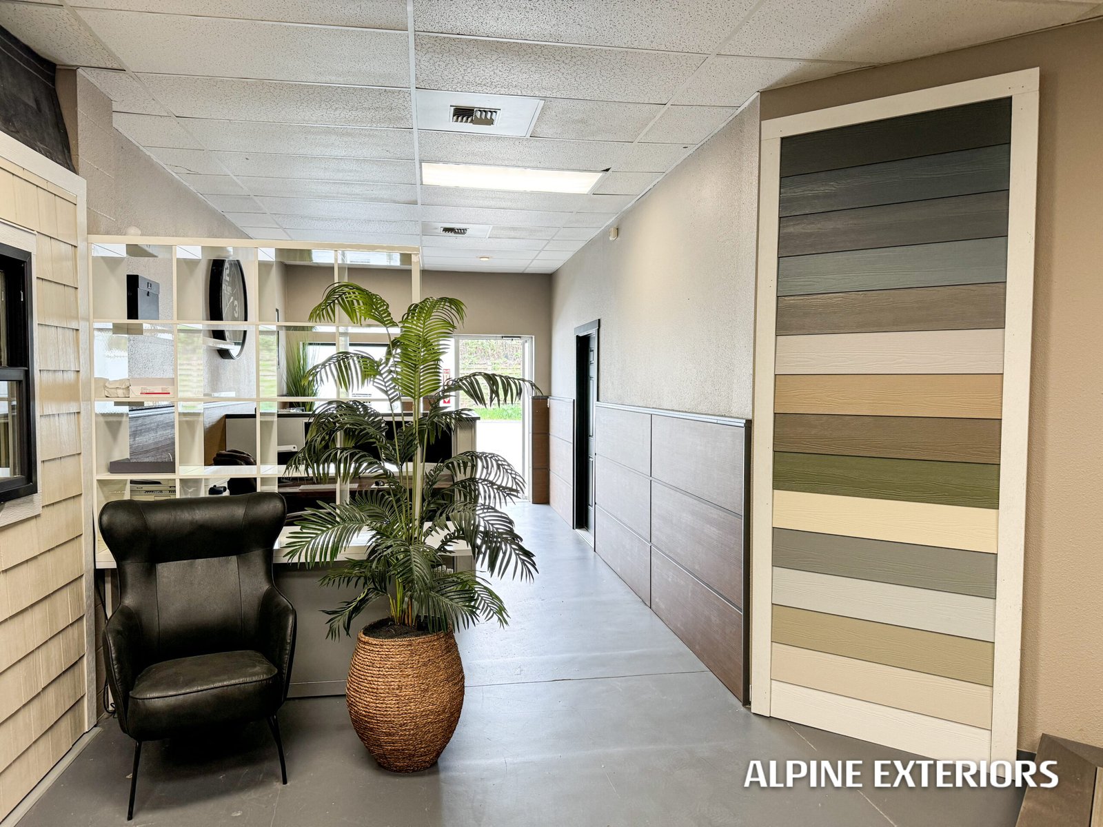 Shoreline sample station black trim window frames hardie shingles office display